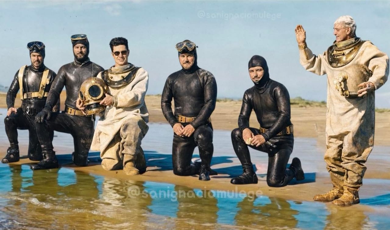 La Bocana divers transitioning from escafandra to mask and wetsuit, 1966